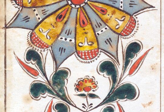 Fraktur drawing of a flower, with face designs
