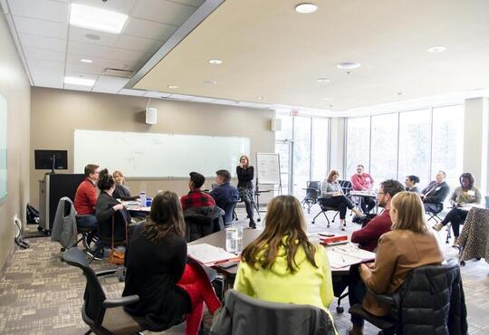 A conflict management class meets in a grebel classroom