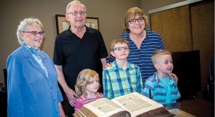 Bender family with Bible at Grebel
