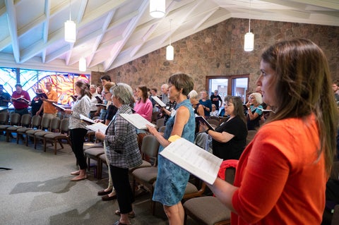 The Grebel Chapel full of Grebel Alumni during a hymn sing.
