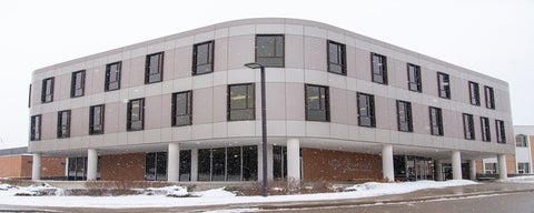 The outside of the main Grebel building in winter