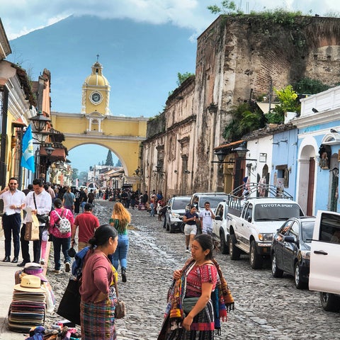 Guatemala street view with women selling goods on the street