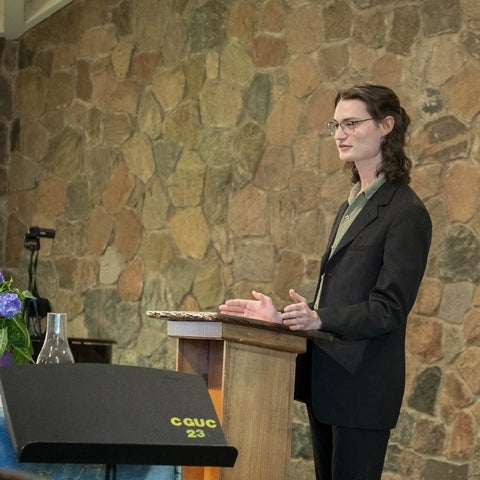 Josiah Ropp standing at a podium 