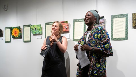 Leah Reesor-Keller and Ndagire Brendah in the Grebel Gallery