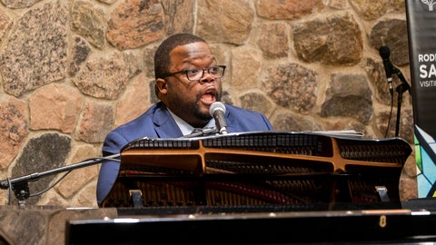 Rev. Dr. Braxton Shelley at a piano