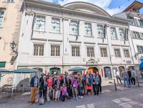 a group of people outside a building