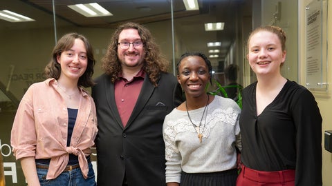 four students who competed in the peace speech contest