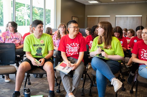 students speak with one another