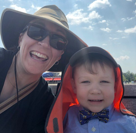 amanda hooykaas and a child posing