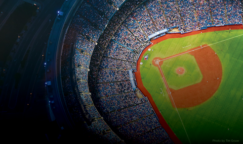 An overhead photo of the rogers centre, a baseball diamond within a round stadium.