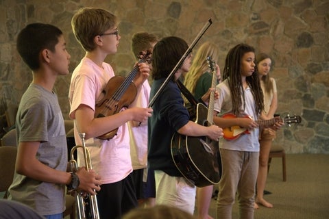 Students playing instruments OMMC 2024