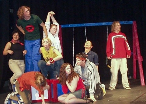 cast of godspell looking off stage 