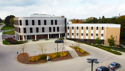 A birds eye view of the Grebel front entrance, and parking lot