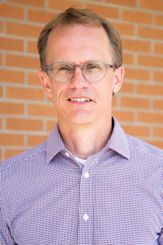 headshot of Paul Heidebrecht