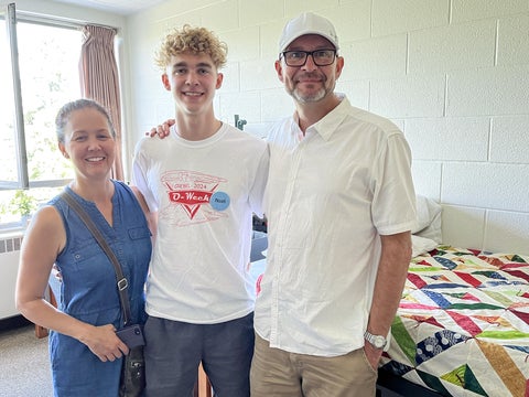 Rebecca, Noah, and Duane in Grebel residence room 