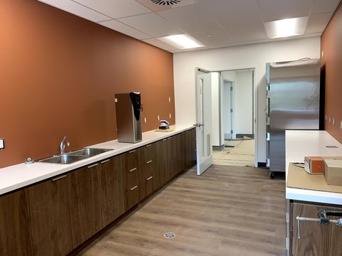 pantry kitchen with sink and fridge 