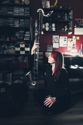 kathryn ladano holding a Bass Clarinet