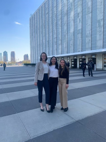 three students posing at UN Building
