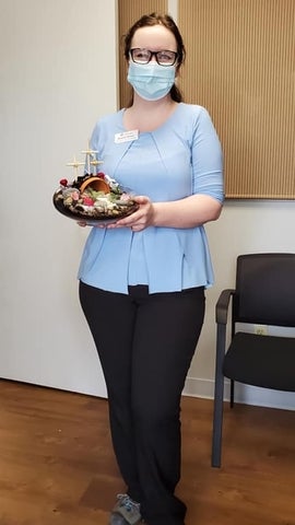 Niamh posing holding something 