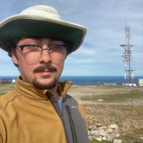 richard cunningham standing in a field