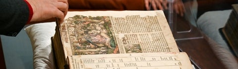 a restored bible from the archives on display