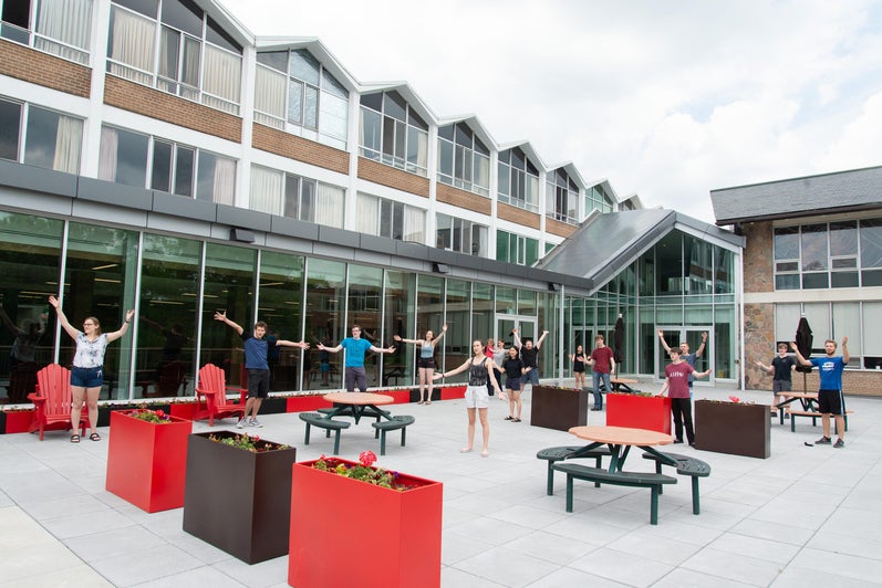 Students celebrate the new patio