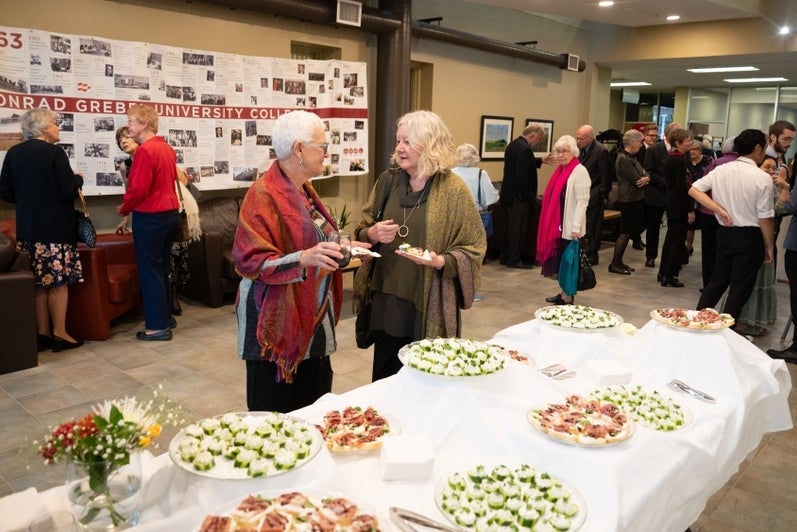 Guests enjoy snacks in the atrium