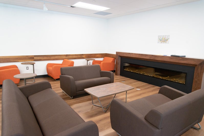 A view of the new lounge area and fireplace