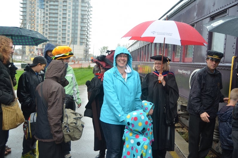 people getting on a train