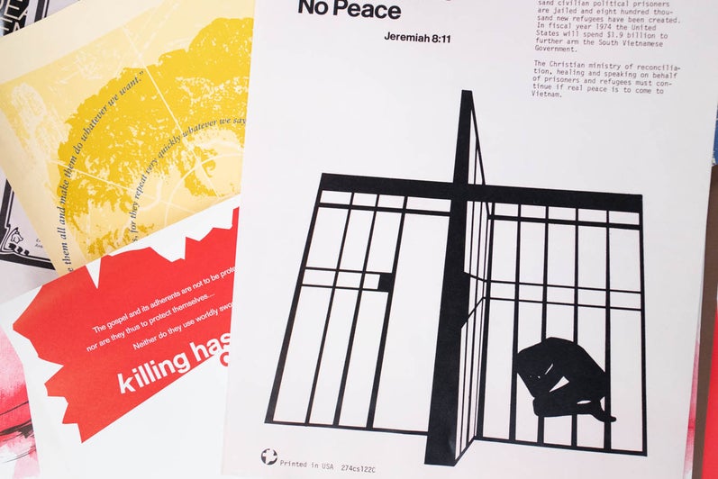 A pile of peace posters