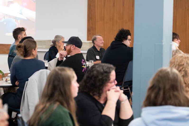 Peter Hart, a retiring custodian at Grebel, among the Grebel dinner guests