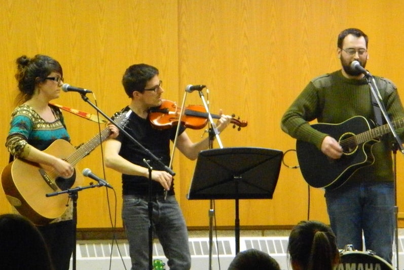 three grebel students play guitar and violin