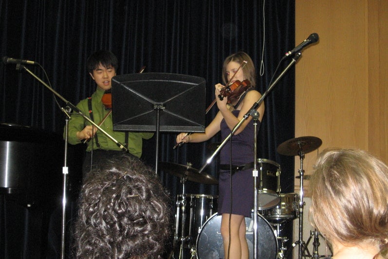 Students on the great hall stage 2000s