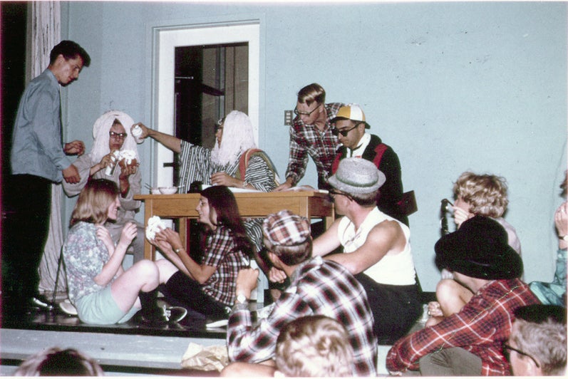 A group of students from the 60's perform a skit