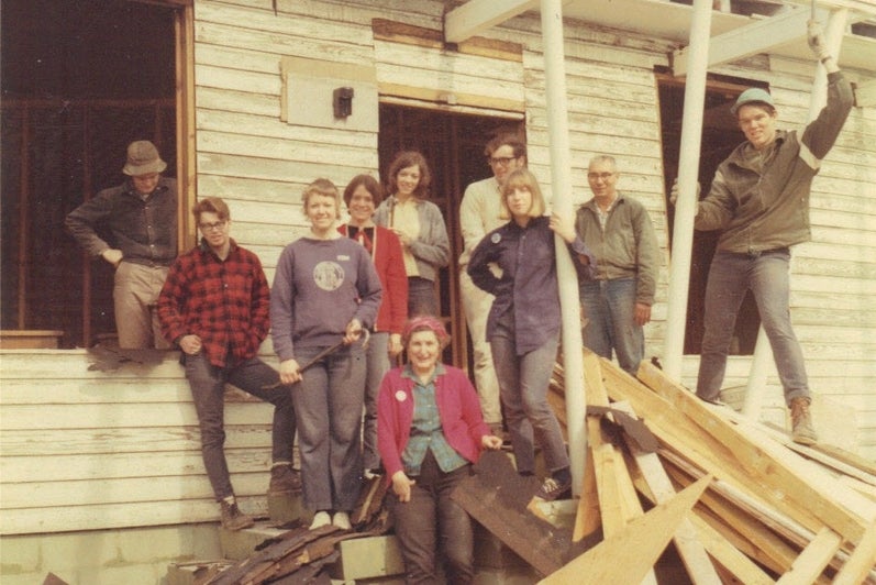 Students on site repairing a home destroyed by a hurricane