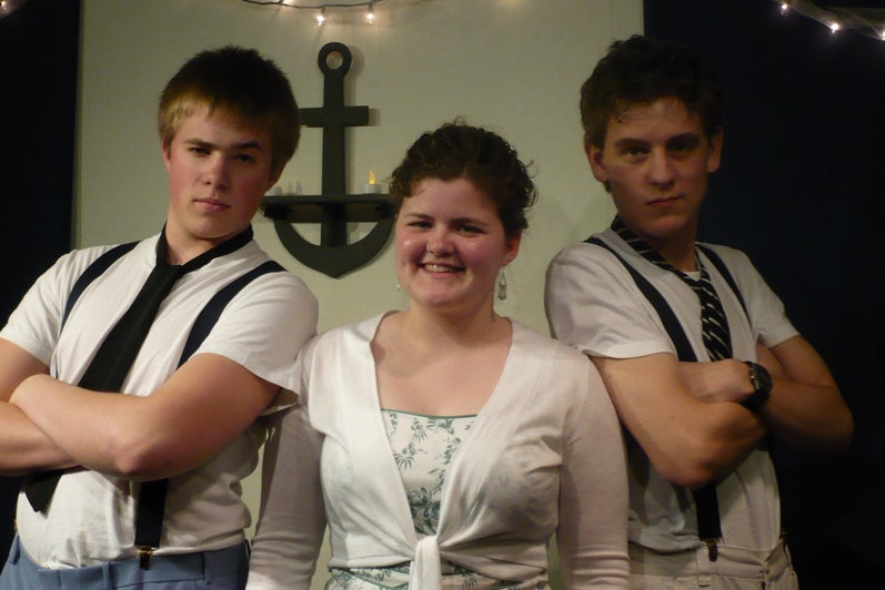 Three students dressed up as characters for the Grebel Talent Show (2000s)