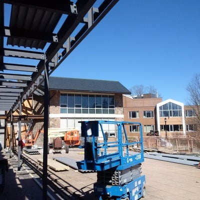 Steel goes up outside the grebel patio