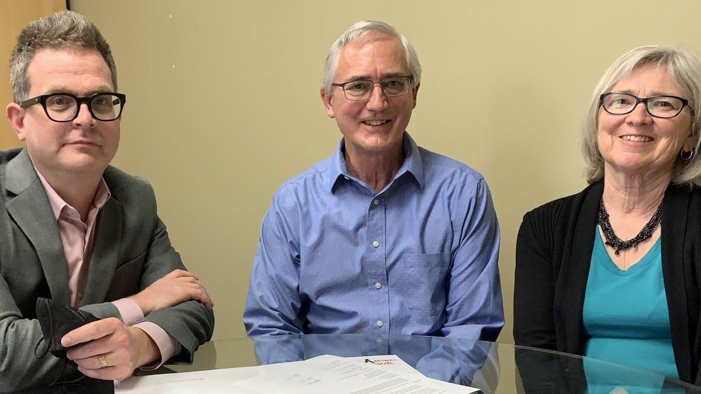 Marcus, Henry Paetkau and his wife Leonora  sitting together