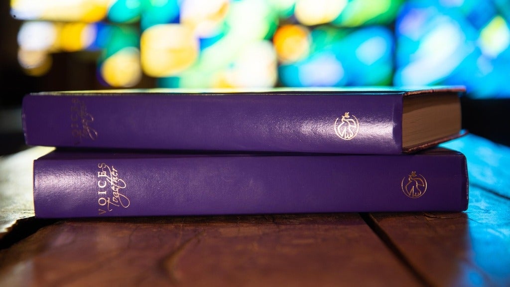 voices together books stacked on eachother 