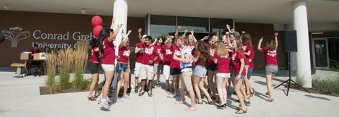 Happy students jumping