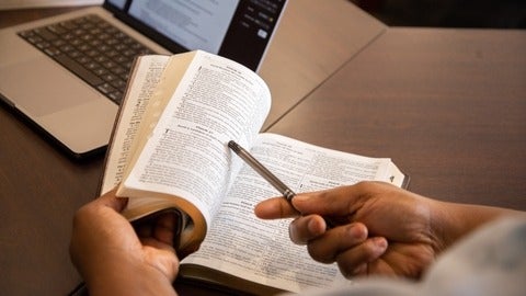 someone studying the bible