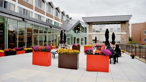 grebel patio with flowers in flower beds