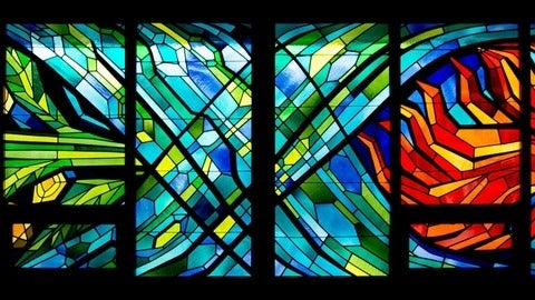 stained glass window with blues and reds 