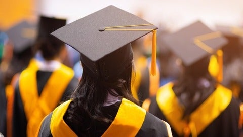 image of students in grad robes and caps