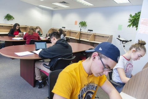 students use the silent study room to write