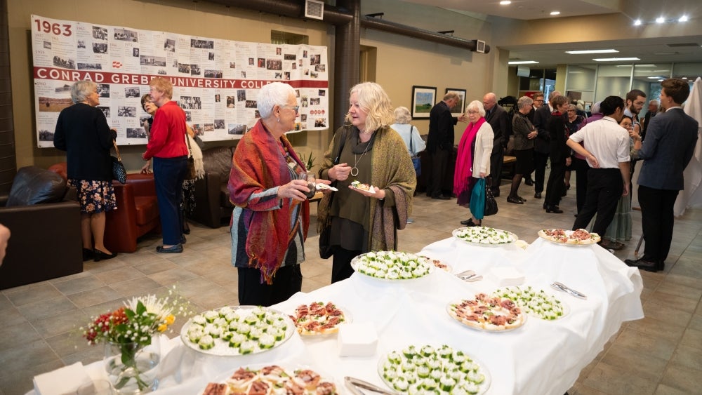 Guests enjoy snacks in the atrium