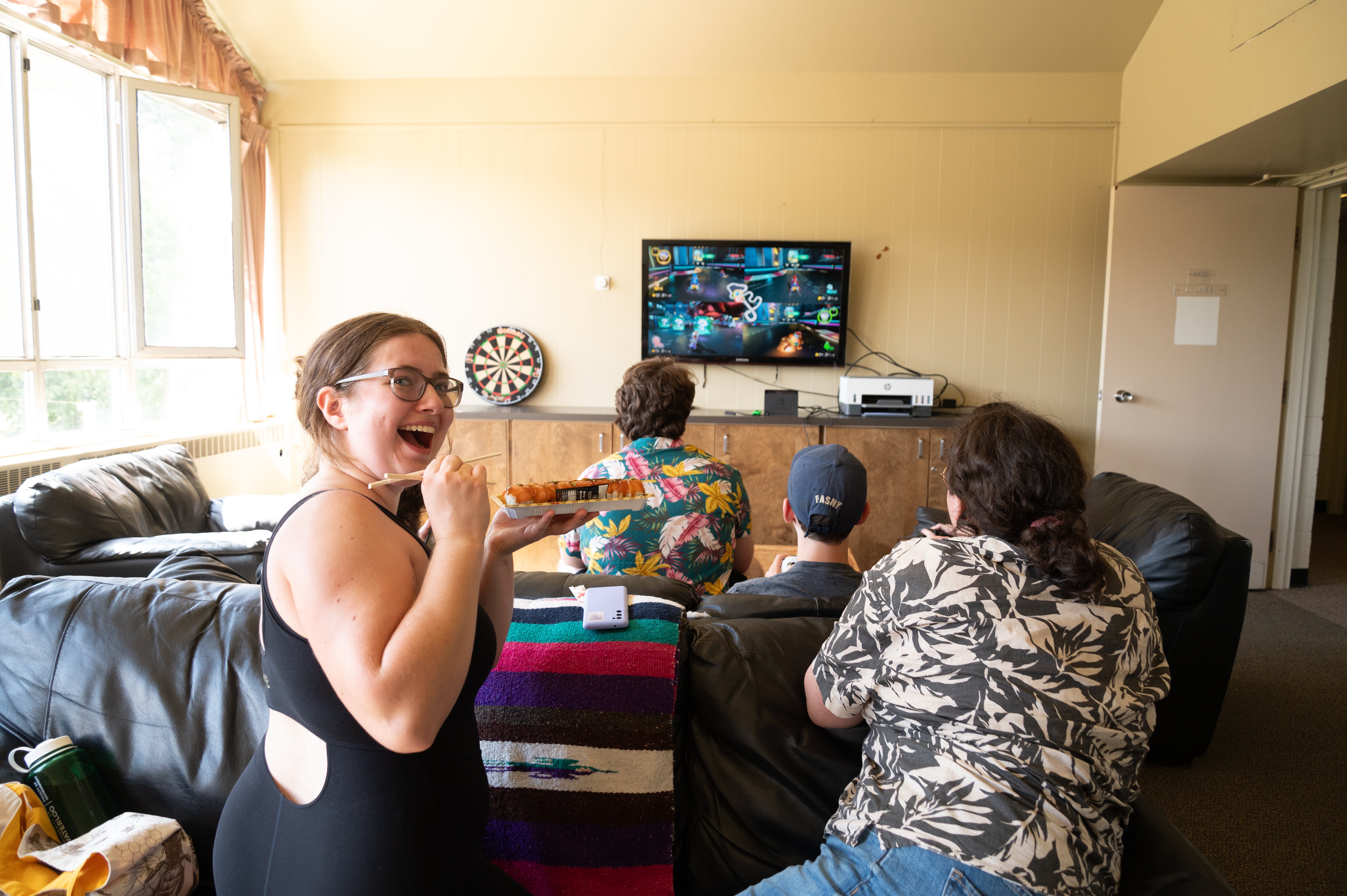 students playing video games in the lounge