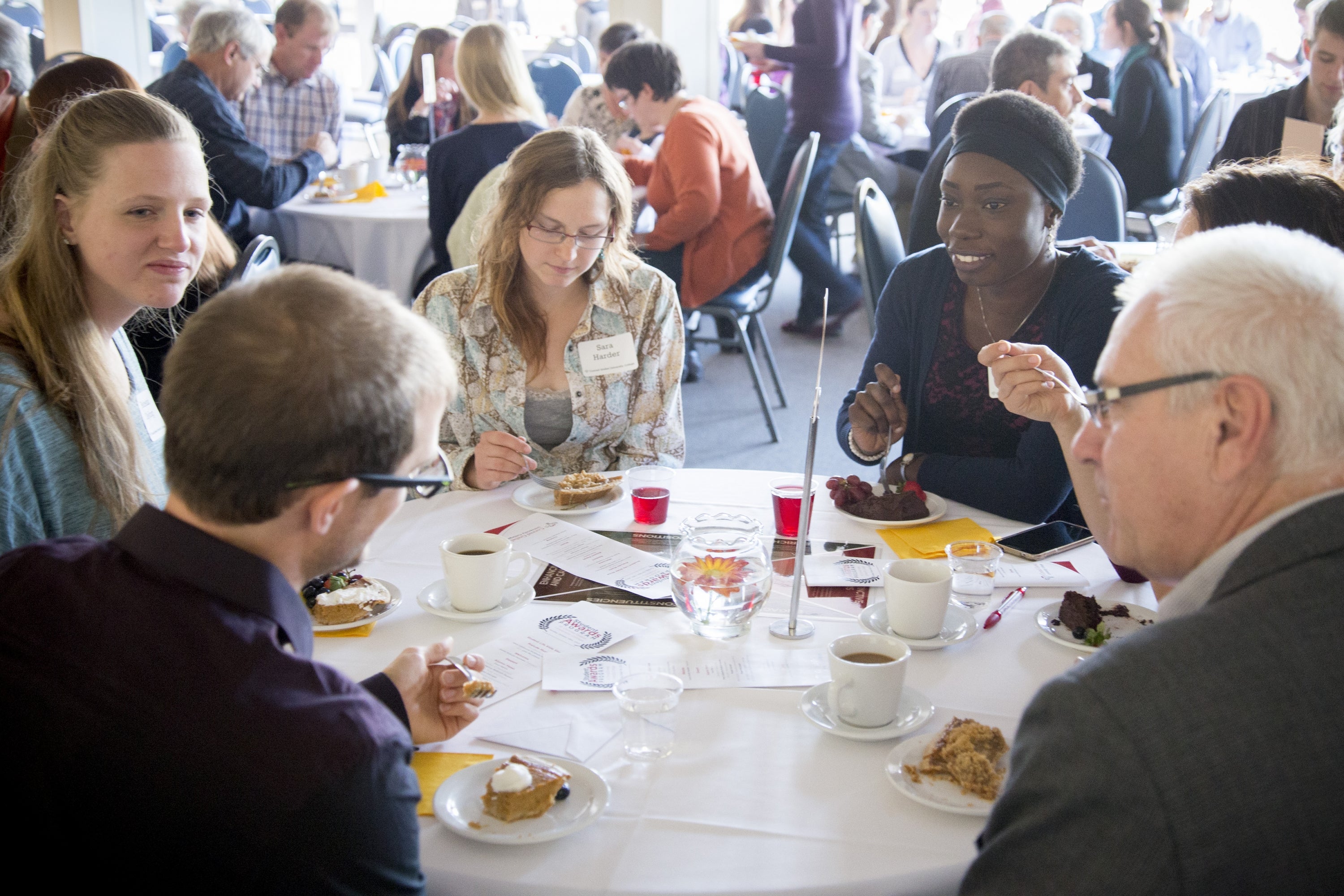 students sitting at dinner table