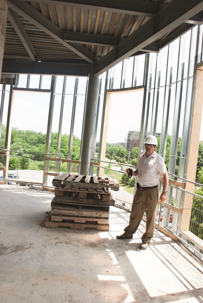 Fred Martin checks out the view in the corner of the MSCU Centre for Peace Advancement.