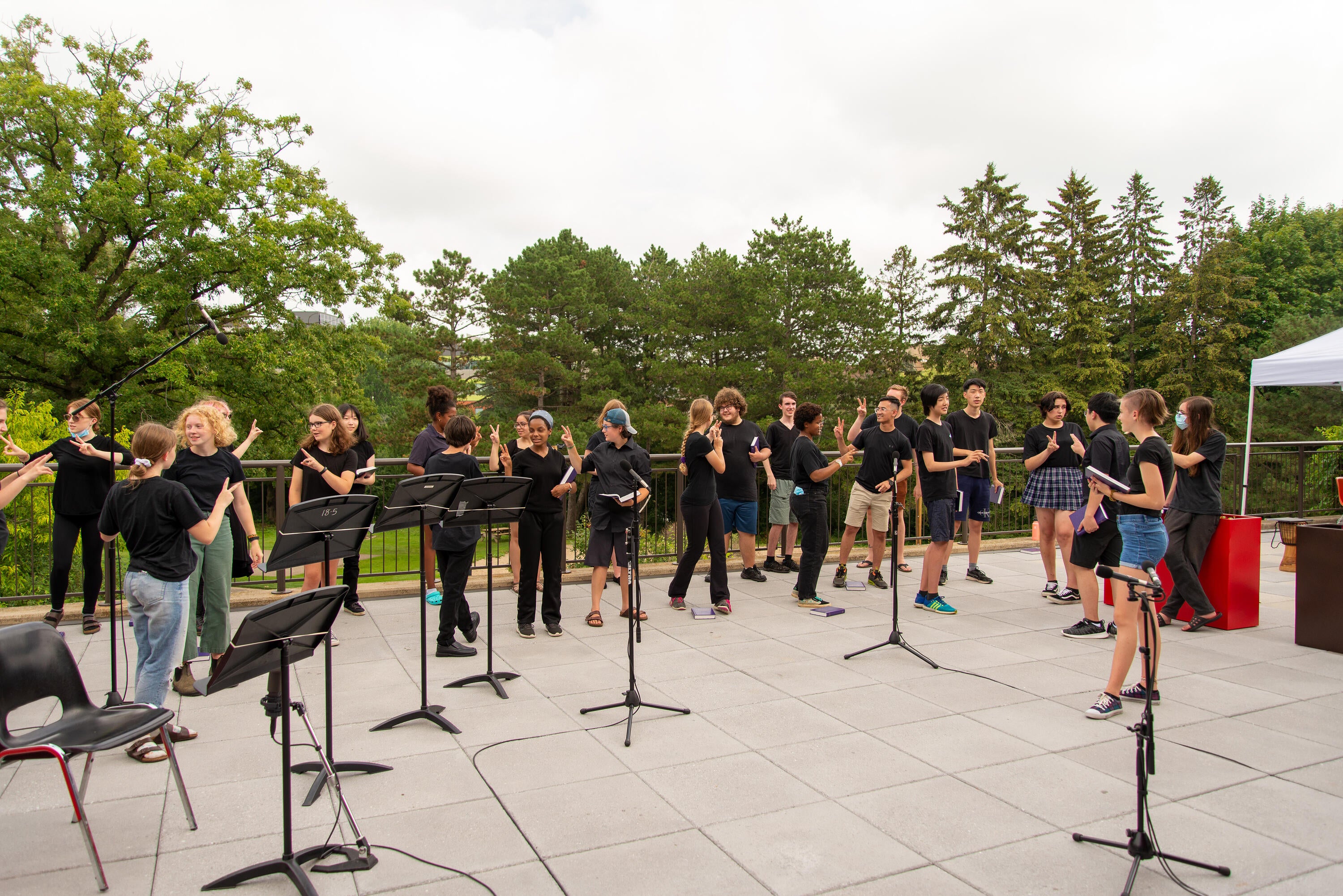 campers sing on the grebel patio